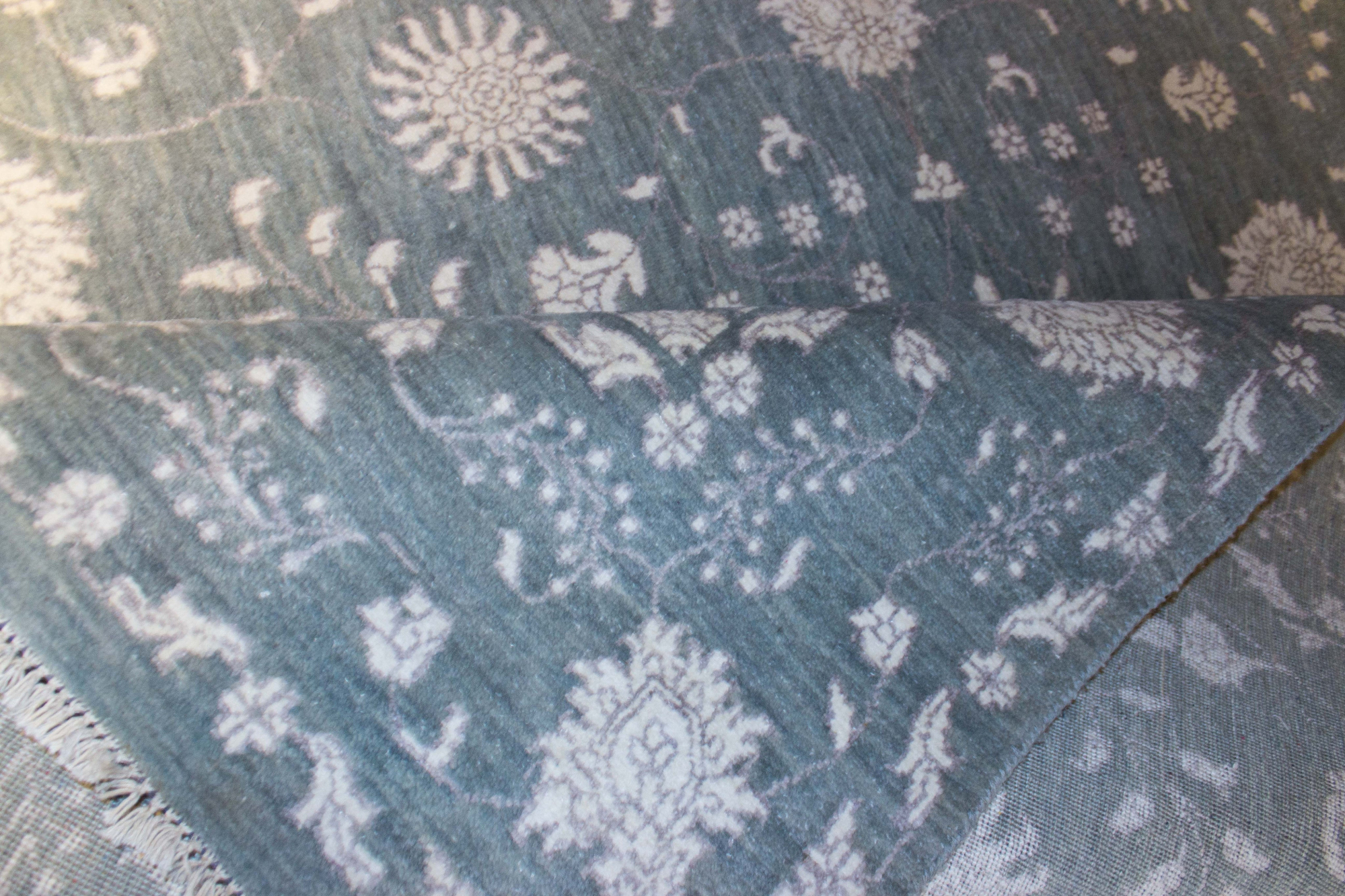 Punja Grey Wool Hand Knotted Indian Rug, featuring Grey tones and Floral design, ideal area rug for any room in your home.