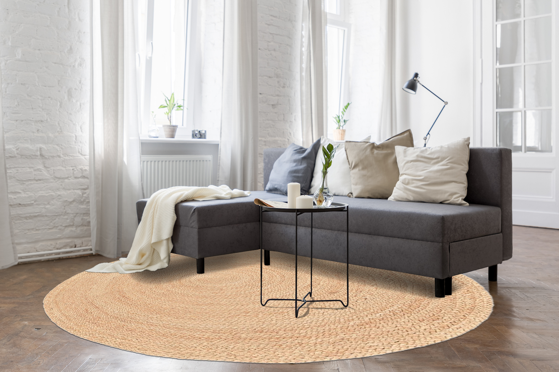 Jensen Natural Jute Braided Round Indian Rug, featuring Ivory tones and Minimal design, ideal area rug for any room in your home.
